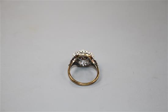 A 1960s 18ct gold and illusion set diamond cluster ring,
